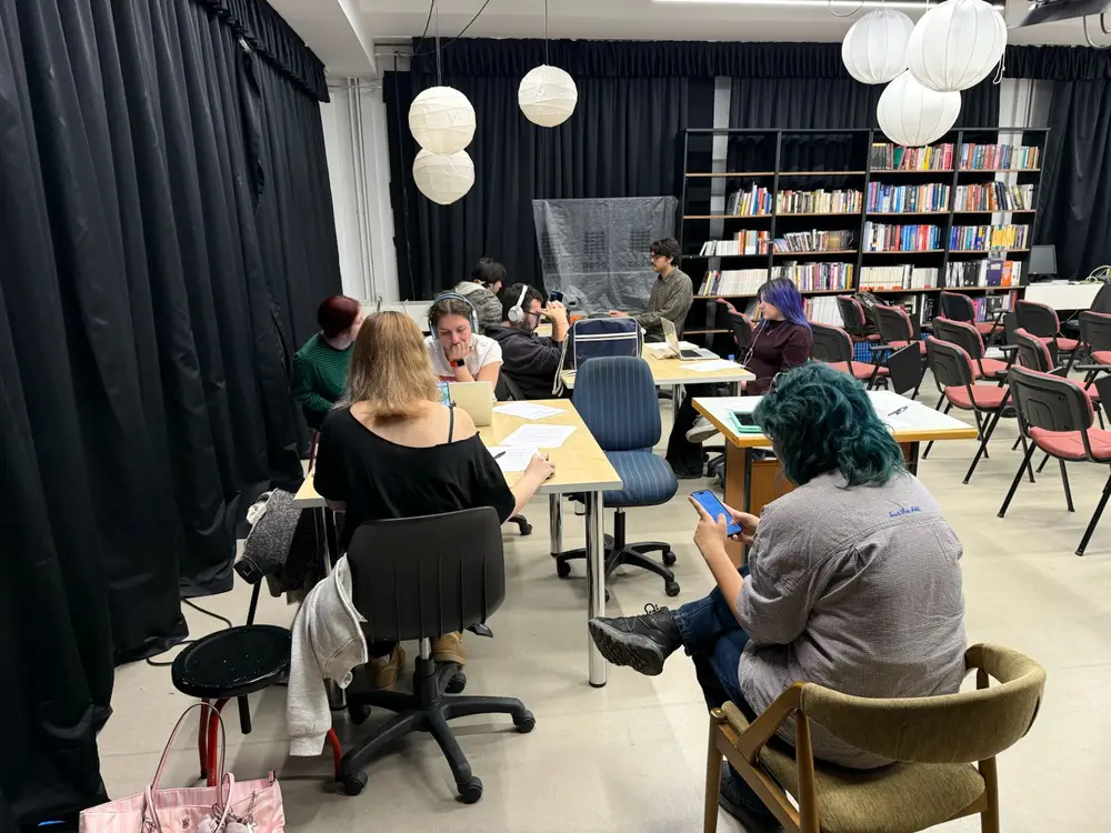 Pilot session — wider view of the studio with all participants